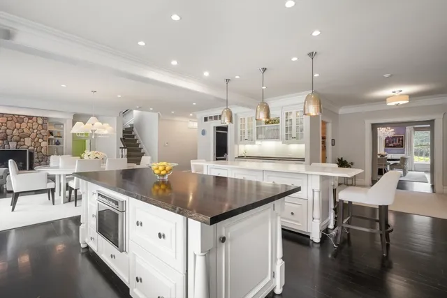 a kitchen with stainless steel appliances granite countertop a stove and a sink
