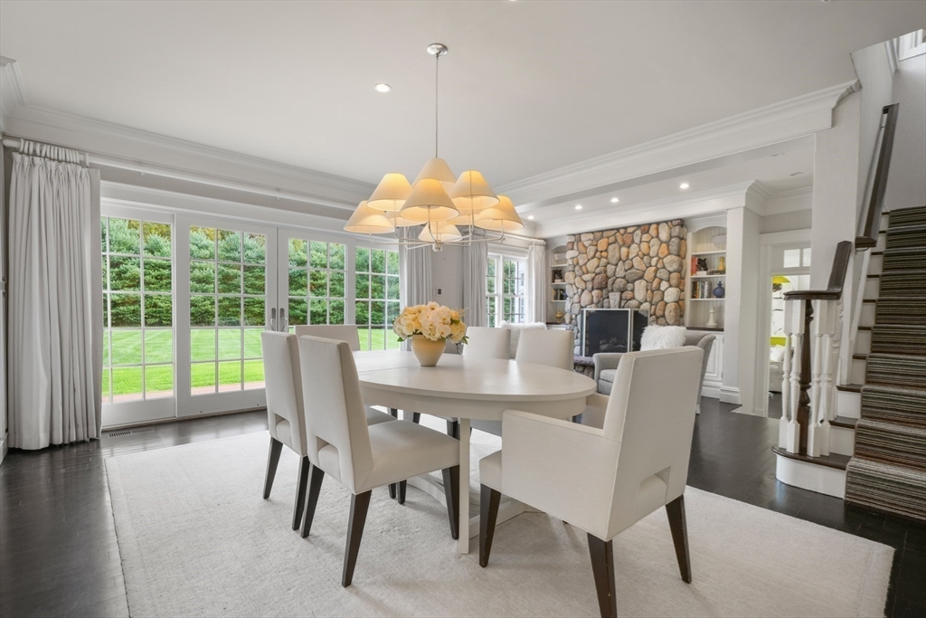 8 Hamlins Crossing East Dover, MA 02030 - Photo 16 of 42 a dining room with furniture a chandelier and wooden floor