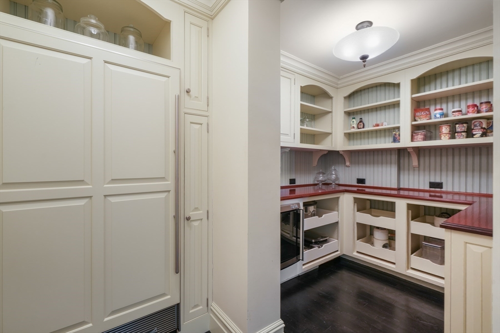 8 Hamlins Crossing East Dover, MA 02030 - Photo 21 of 42 a view of kitchen with cabinets and wooden floor