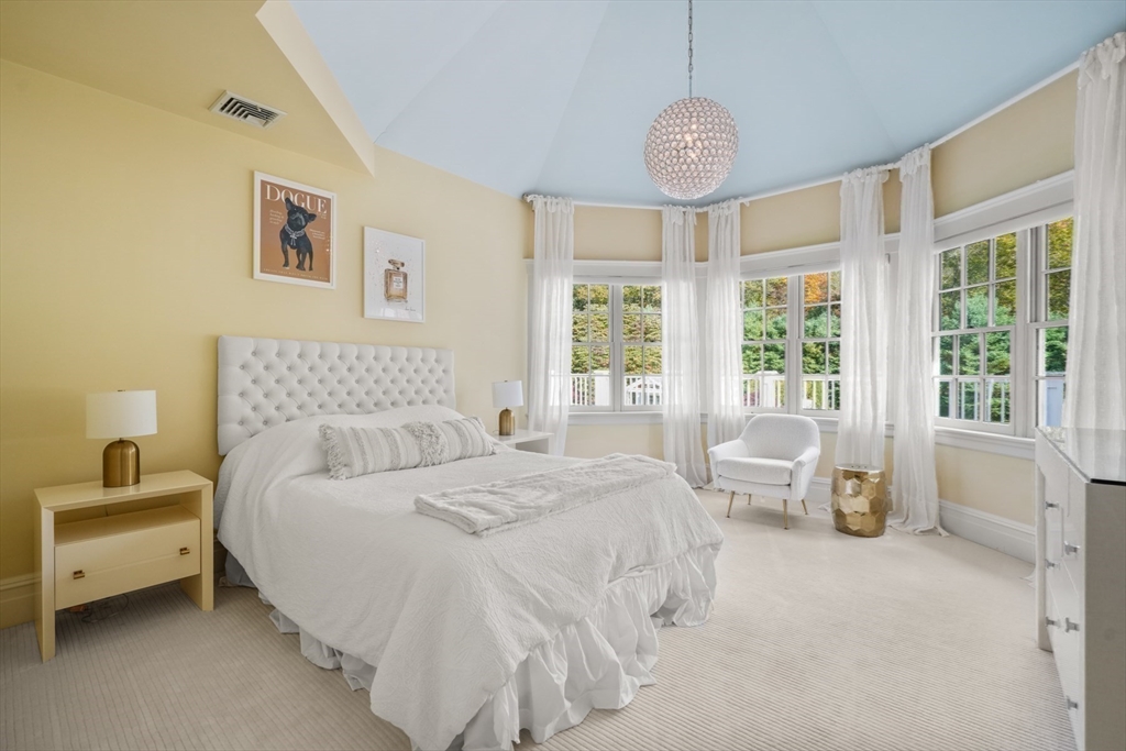8 Hamlins Crossing East Dover, MA 02030 - Photo 32 of 42 a bedroom with a bed a table and chair