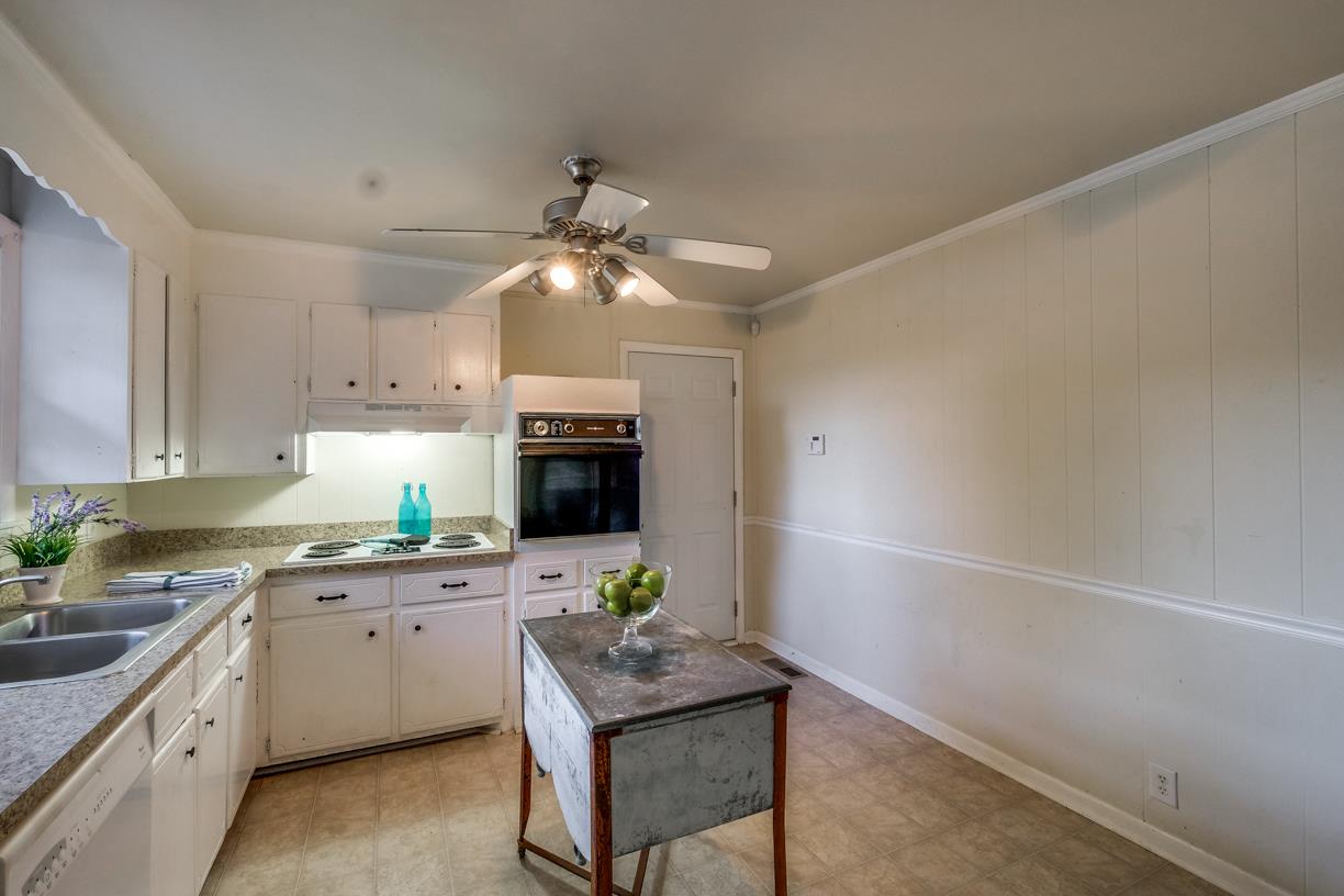 1808 Hygeia Road Greenbrier, TN 37073 - Photo 3 of 12 a kitchen with a sink cabinets and window
