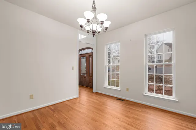 a kitchen that has a sink and a stove