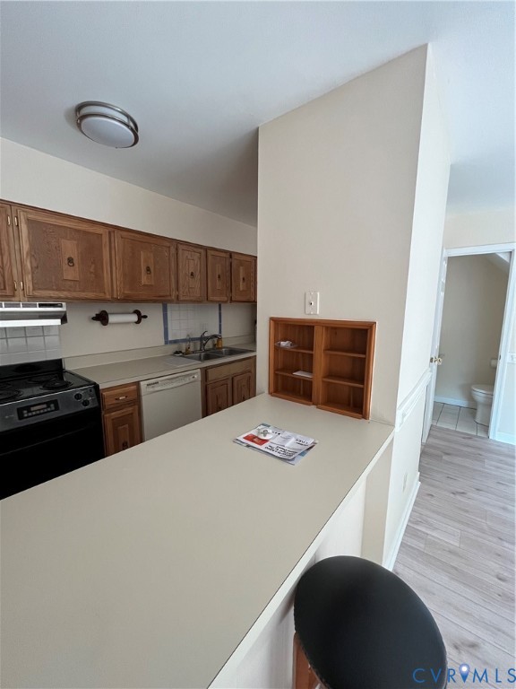 804 Nantucket Court Richmond, VA 23235 - Photo 6 of 12 a kitchen with stainless steel appliances kitchen island granite countertop a sink dishwasher stove and refrigerator