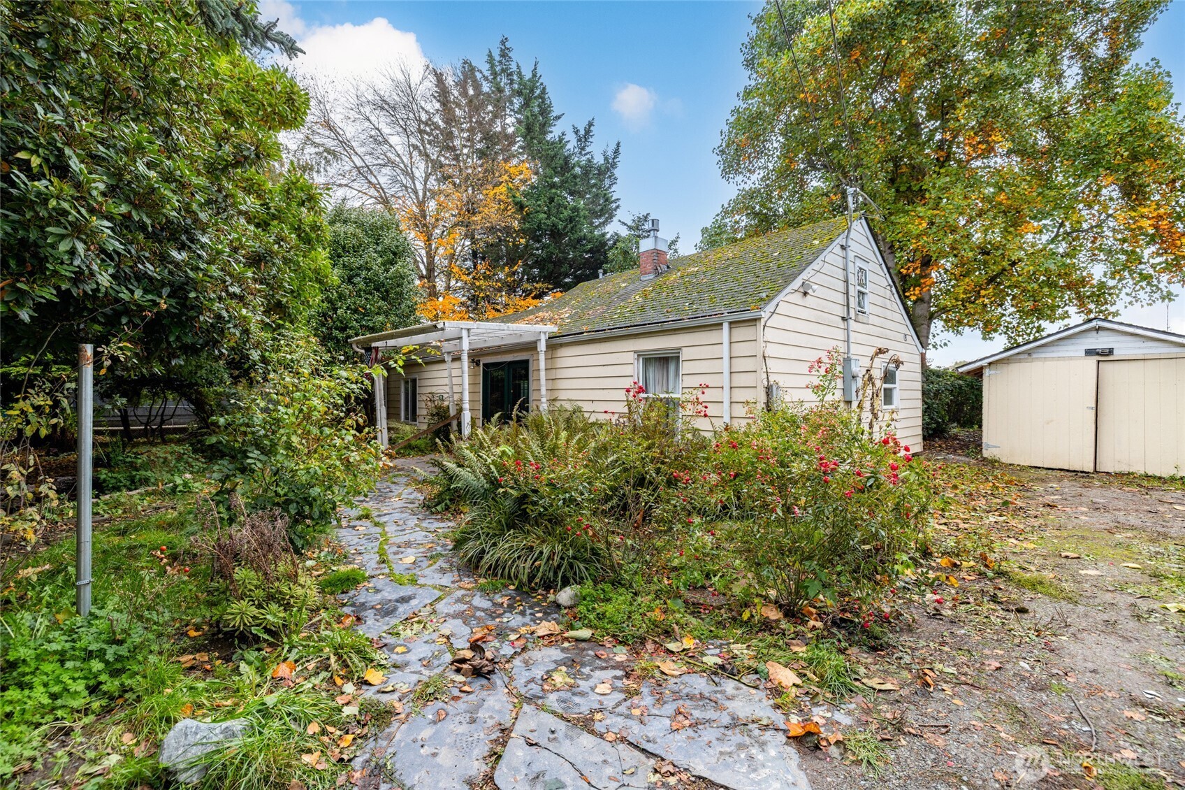 17662 Dunbar Road Mount Vernon, WA 98273 - Photo 1 of 18 a view of a house with a yard and potted plants