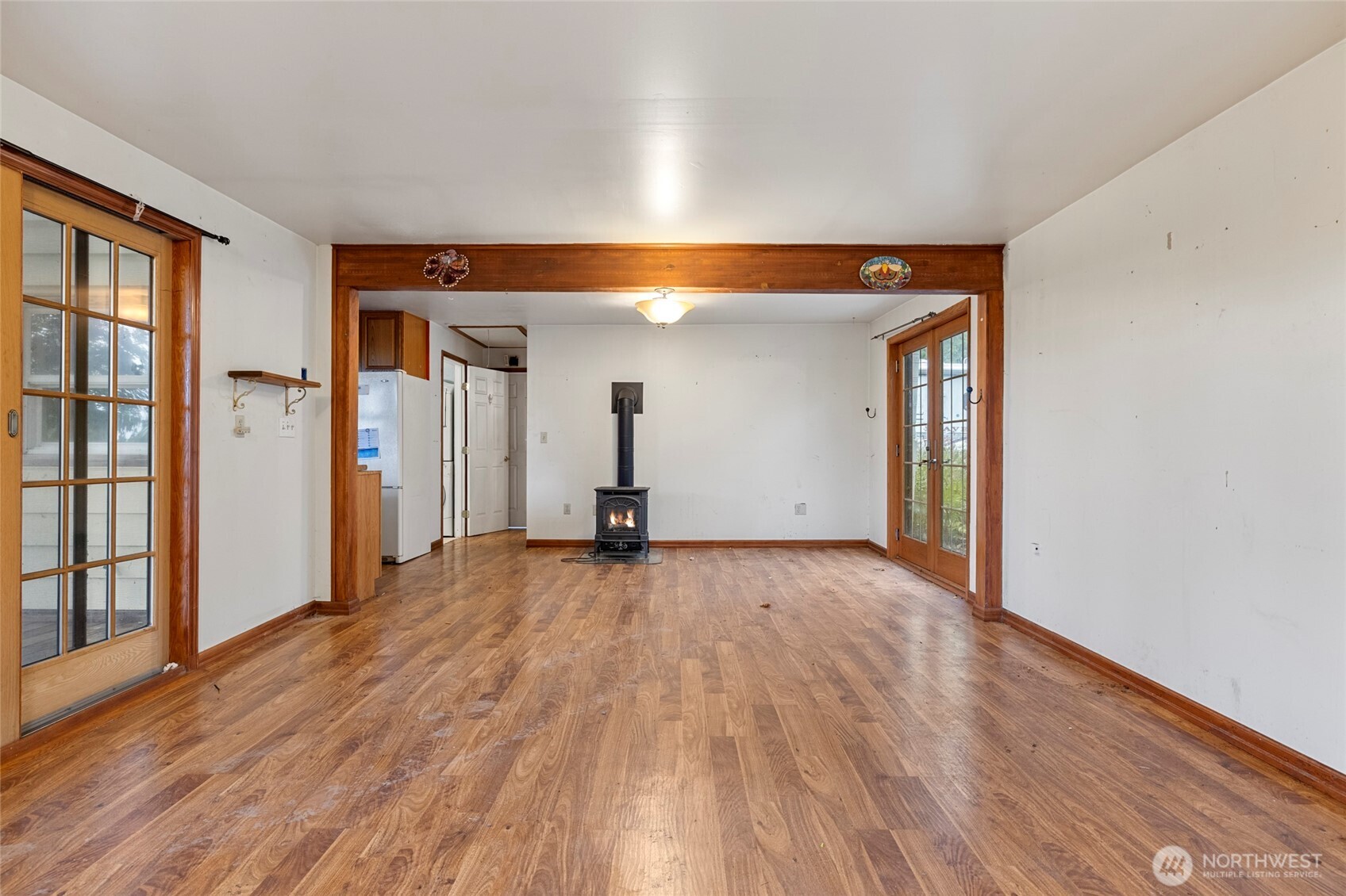 17662 Dunbar Road Mount Vernon, WA 98273 - Photo 3 of 18 a view of empty room with wooden floor and fan