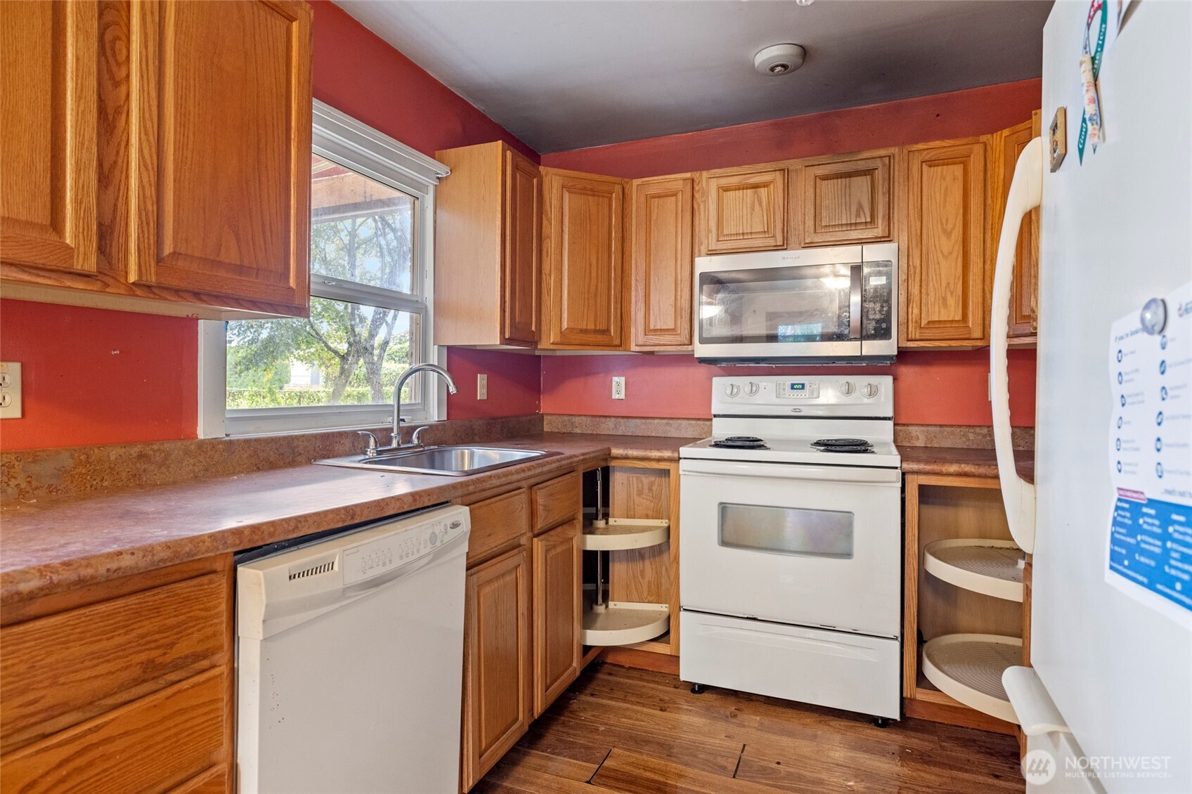 17662 Dunbar Road Mount Vernon, WA 98273 - Photo 4 of 18 a kitchen with a stove sink and cabinets