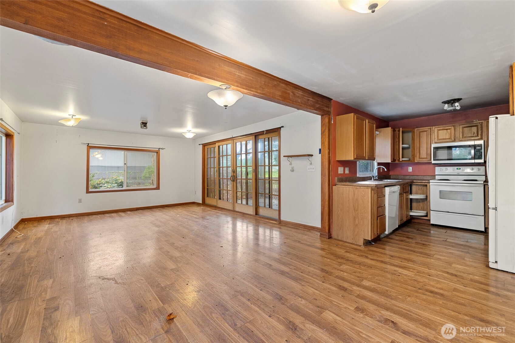 17662 Dunbar Road Mount Vernon, WA 98273 - Photo 5 of 18 a view of a kitchen with furniture and wooden floor