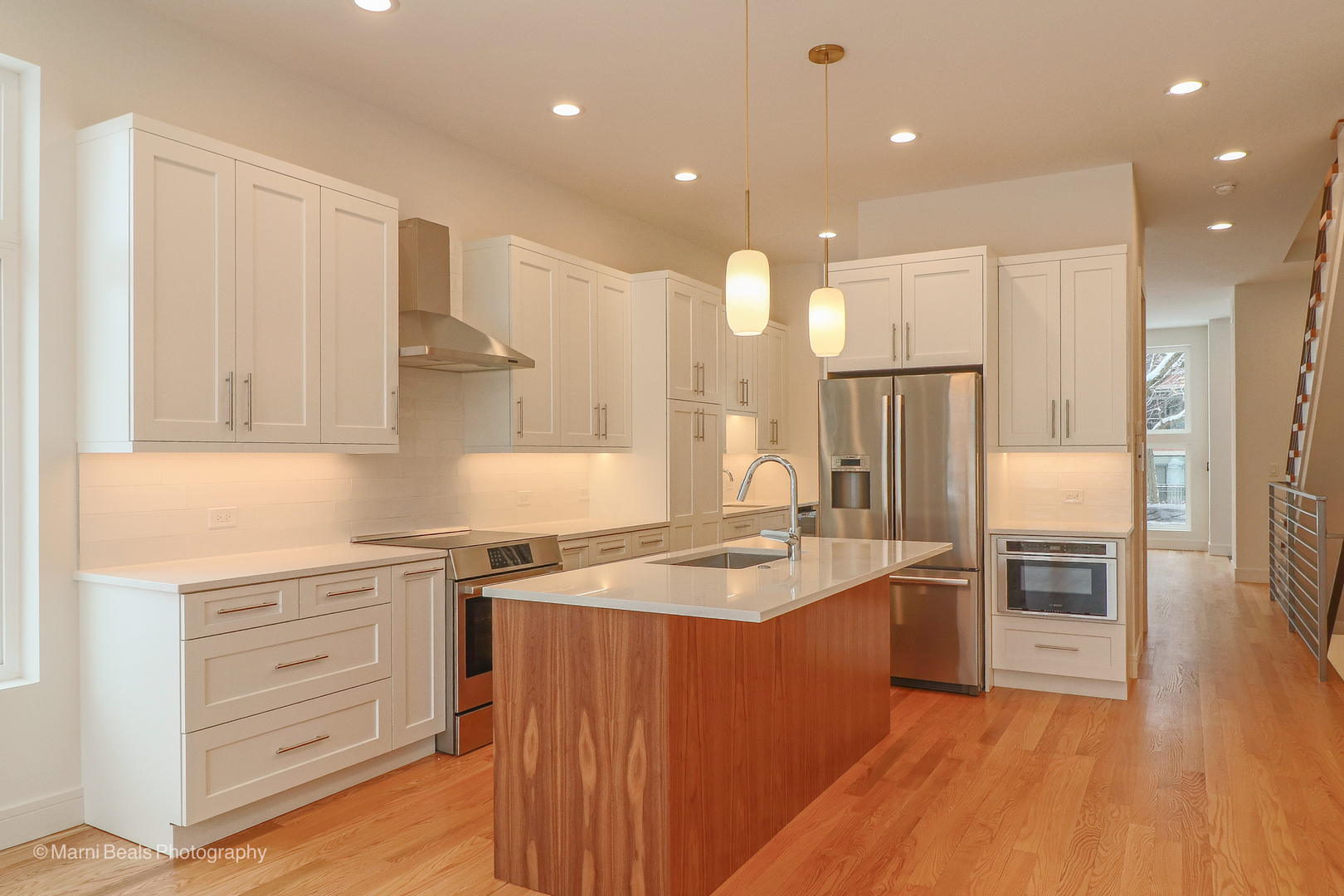 6123 South Ellis Avenue Chicago, IL 60637 - Photo 4 of 31 a kitchen with kitchen island a sink stainless steel appliances and cabinets
