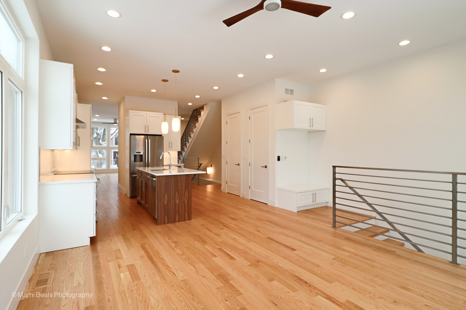 6123 South Ellis Avenue Chicago, IL 60637 - Photo 8 of 31 a view of kitchen with kitchen island stainless steel appliances refrigerator stove microwave and cabinets