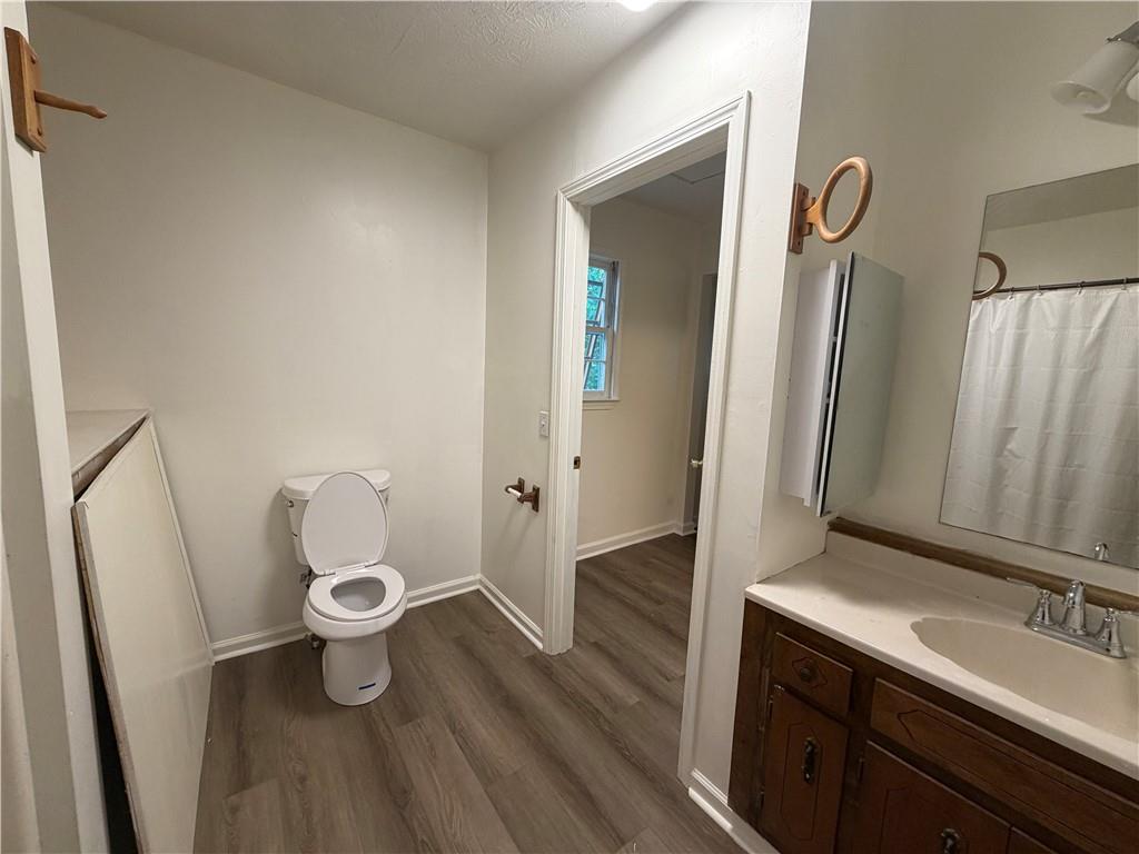 86 Robert Jones Road Dawsonville, GA 30534 - Photo 12 of 19 a bathroom with a sink and a mirror