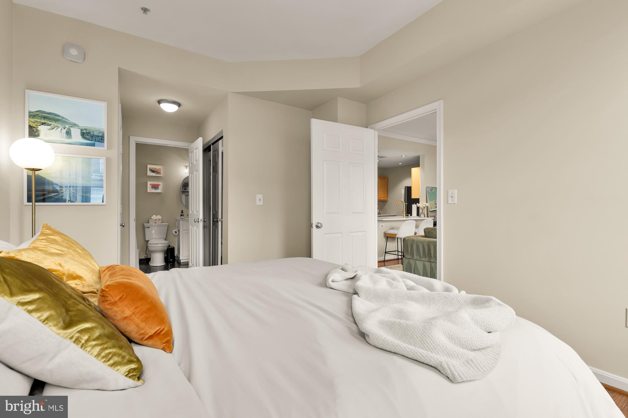 2004 11th Street Northwest, Unit 436 Washington, DC 20001 - Photo 11 of 15 a large white bed in a white room