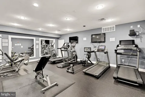 a view of a room with gym equipment