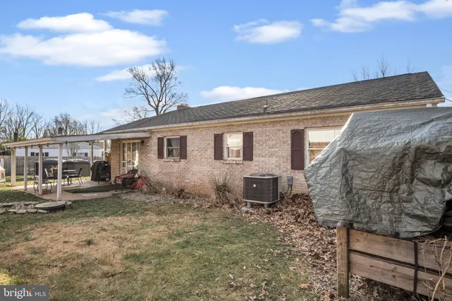 a view of backyard with green space