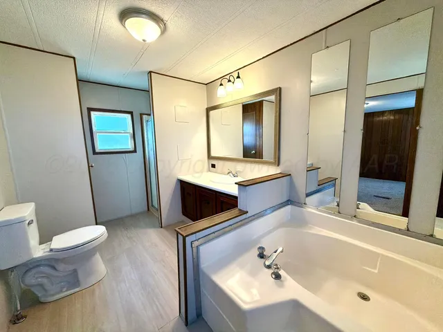 a view of a room with a wooden walls