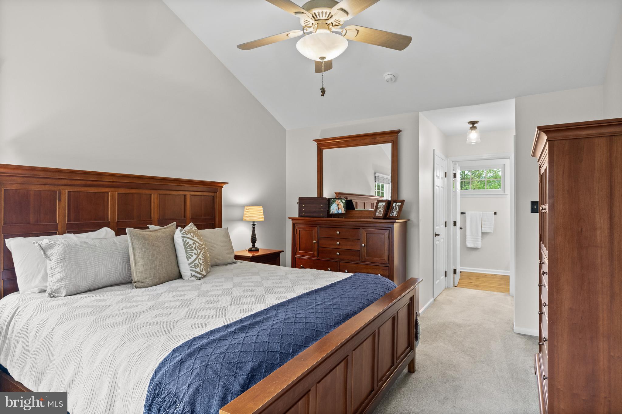 12 Springcress Drive Delran, NJ 08075 - Photo 22 of 46 a bedroom with a bed and a chandelier