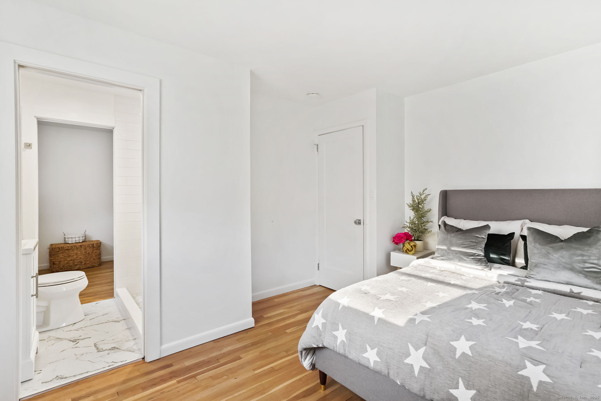 132 Toll House Lane Fairfield, CT 06825 - Photo 19 of 38 a bedroom with a bed and a closet