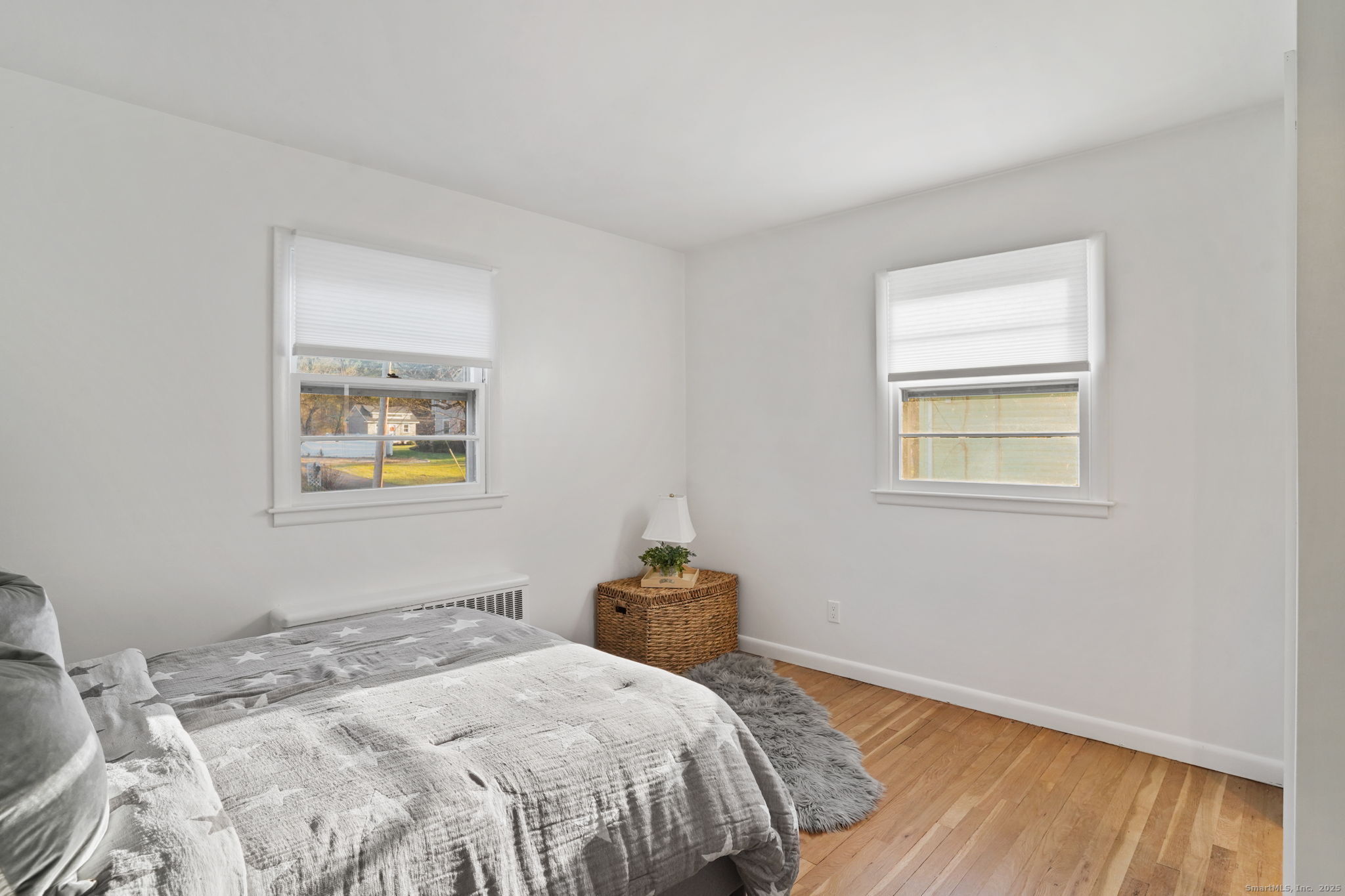 132 Toll House Lane Fairfield, CT 06825 - Photo 20 of 38 a bedroom with a bed and a window