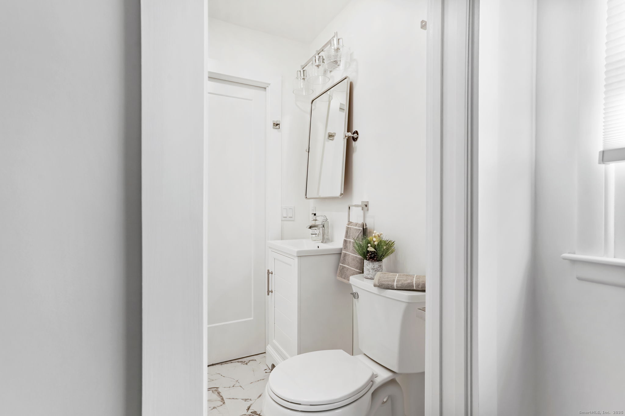 132 Toll House Lane Fairfield, CT 06825 - Photo 26 of 38 a bathroom with a sink a toilet and shower