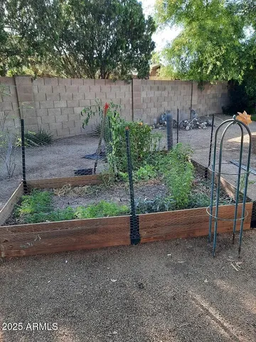 a garden view with a seating space