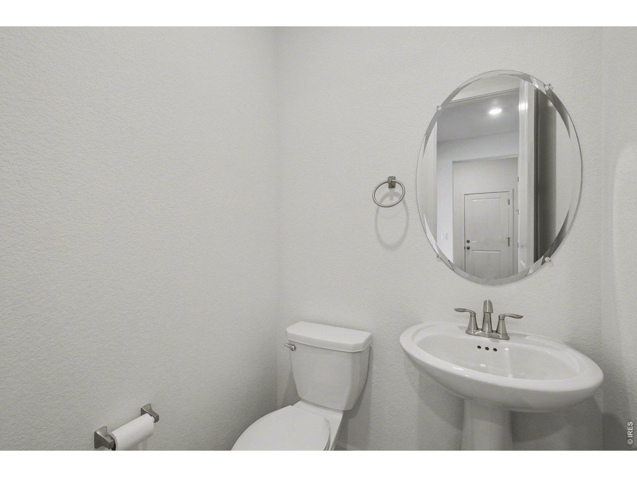5258 Inland Avenue Firestone, CO 80504 - Photo 16 of 44 Powder Room - Main Level