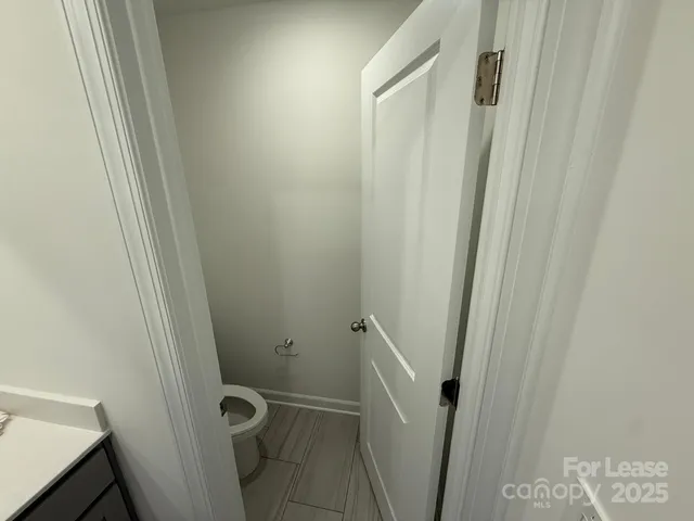 a bathroom with a sink and toilet