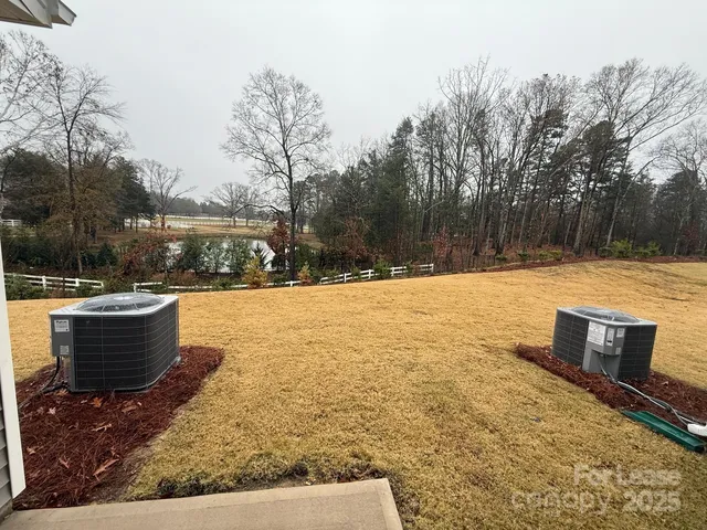 a view of swimming pool with outdoor seating