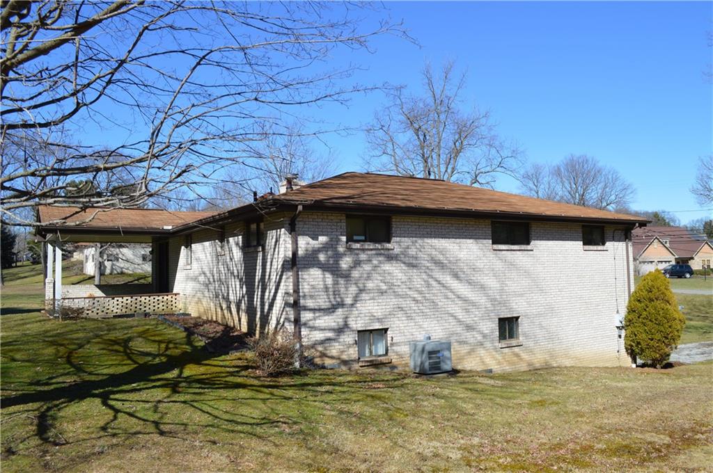 3150 Kane Road Aliquippa, PA 15001 - Photo 3 of 22 Great area and a covered patio overlooking the wooded back yard.