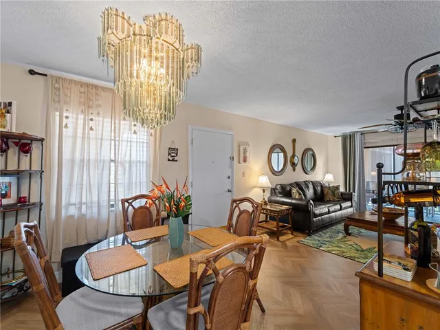 a view of a kitchen and dining room
