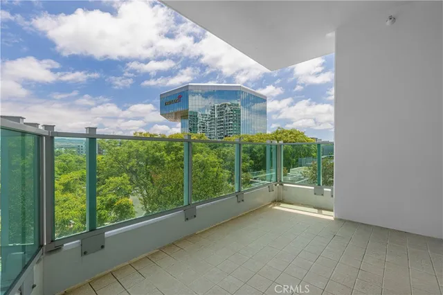 a view of a garden from a balcony