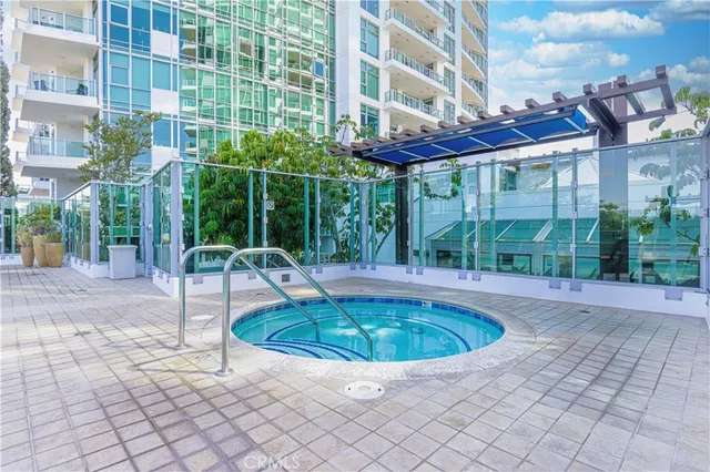 a view of a swimming pool with a patio