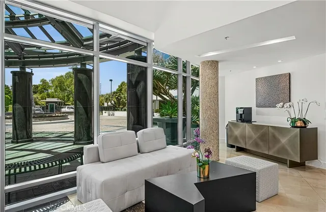 a view of entryway with furniture and a rug