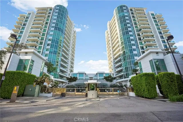 a view of a city with tall buildings