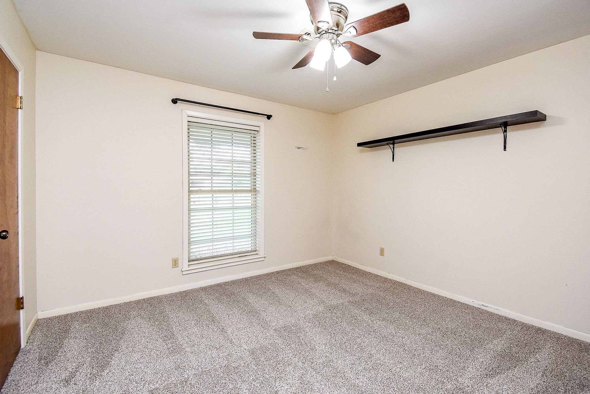 2719 Vail Road Rosenberg, TX 77471 - Photo 19 of 36 a view of an empty room with a window