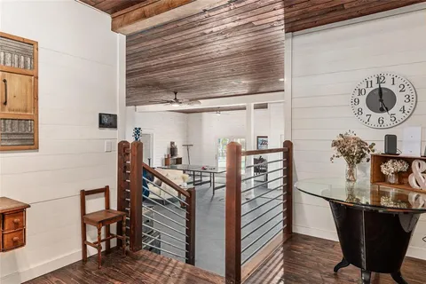a view of entryway with wooden floor