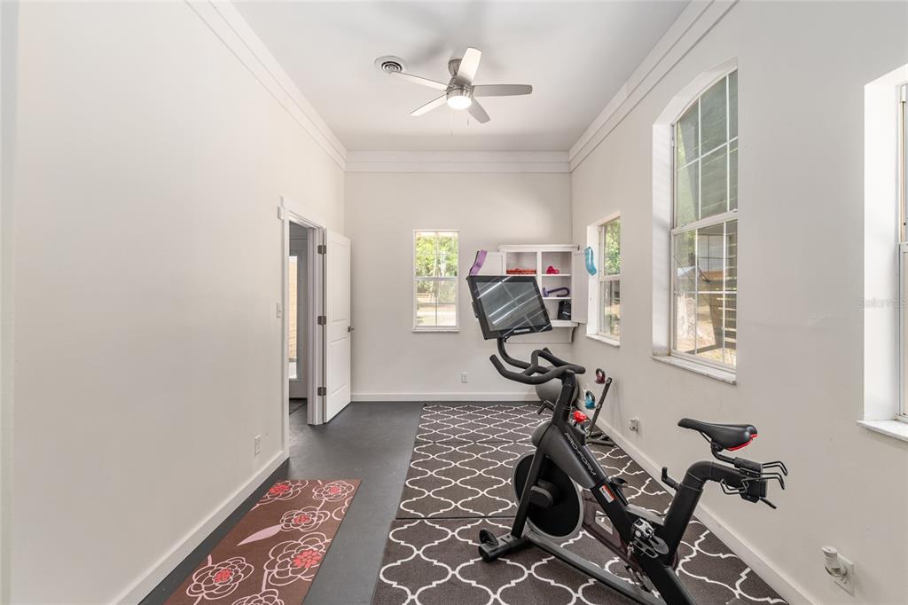 19451 Southeast 2 Street Williston, FL 32696 - Photo 50 of 99 a view of a room with gym equipment