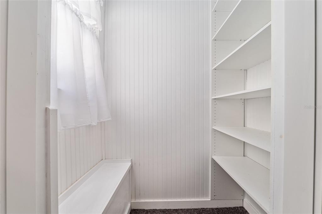 19451 Southeast 2 Street Williston, FL 32696 - Photo 57 of 99 a view of walk in closet with empty racks