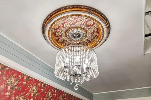 a view of a chandelier in a room
