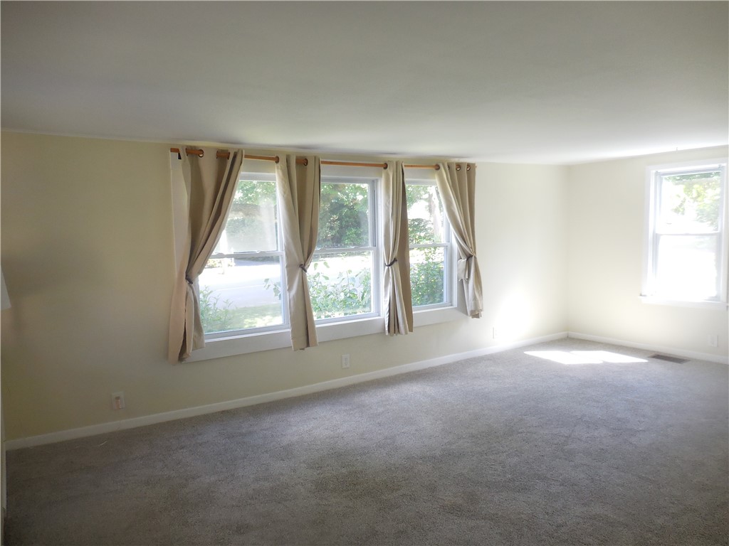 83 North Main Street Perry, NY 14530 - Photo 19 of 42 living room with new carpet