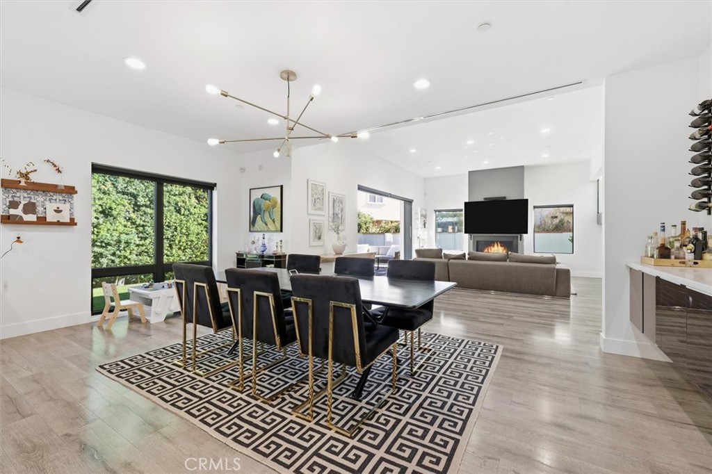 5487 Blanco Way Culver City, CA 90230 - Photo 17 of 58 a living room with furniture a rug and a flat screen tv