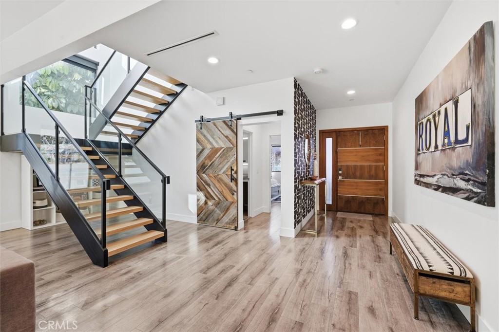 5487 Blanco Way Culver City, CA 90230 - Photo 19 of 58 a view of an entryway with wooden floor