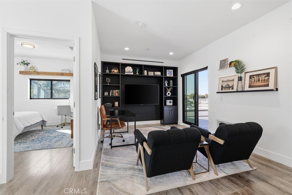 5487 Blanco Way Culver City, CA 90230 - Photo 20 of 58 a living room with furniture and a flat screen tv