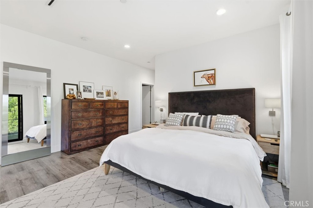 5487 Blanco Way Culver City, CA 90230 - Photo 25 of 58 a bed room with a bed and dresser