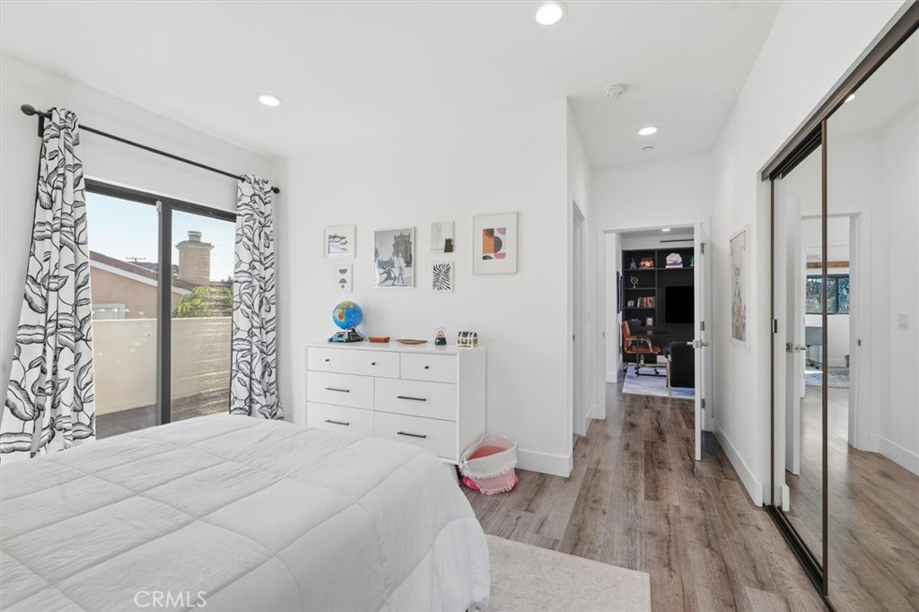 5487 Blanco Way Culver City, CA 90230 - Photo 31 of 58 a bedroom with a bed dresser and a large window