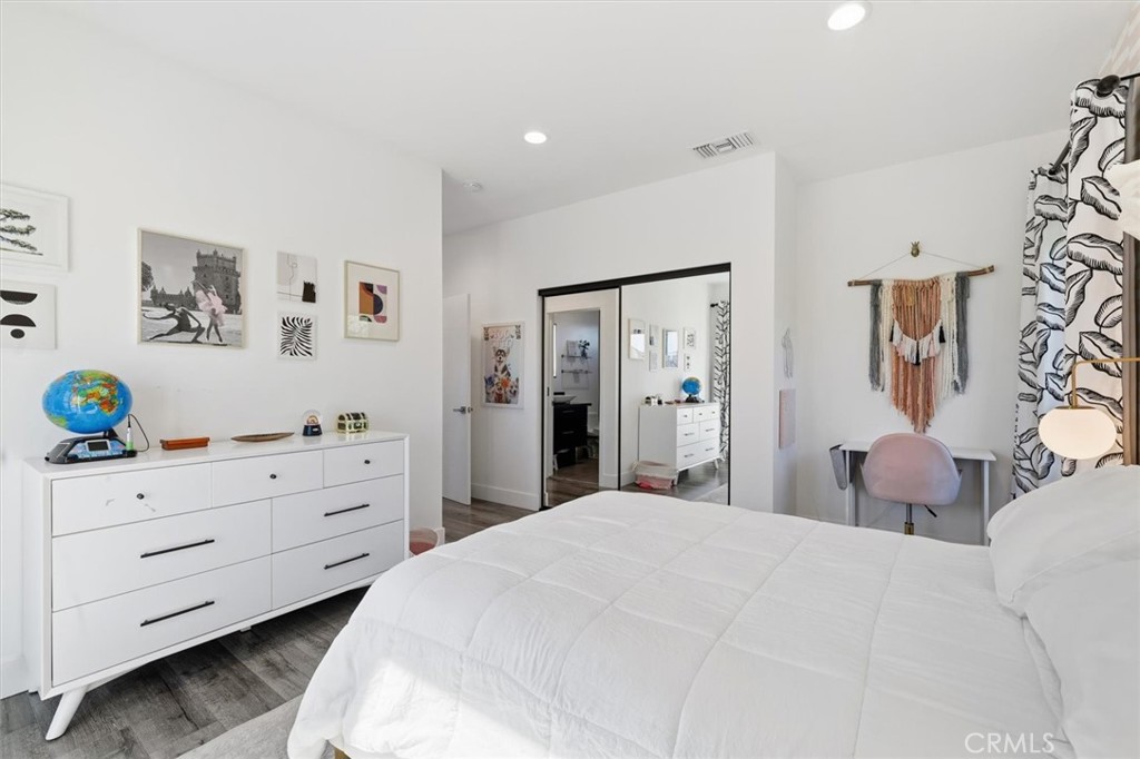 5487 Blanco Way Culver City, CA 90230 - Photo 32 of 58 a bedroom with a bed and a dresser