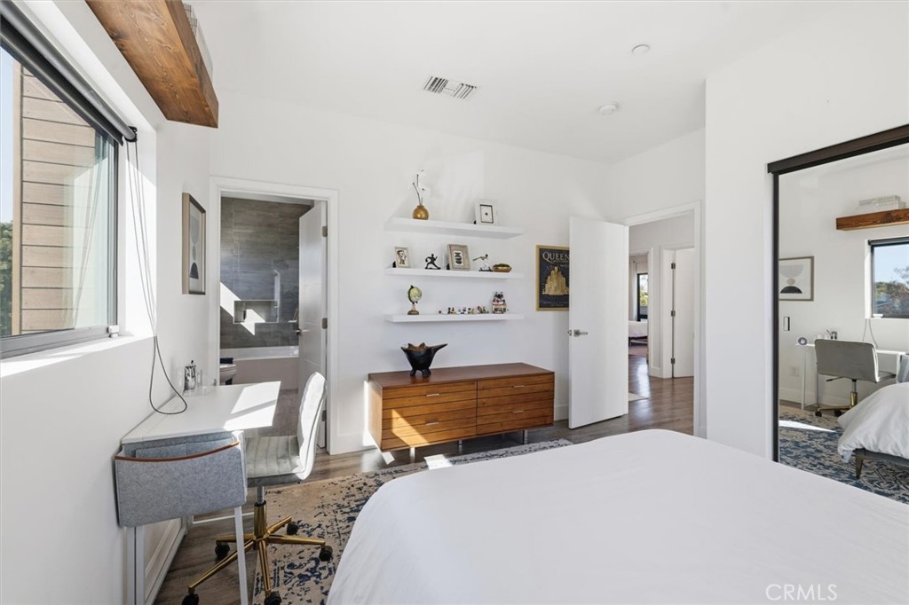 5487 Blanco Way Culver City, CA 90230 - Photo 34 of 58 a bedroom with a bed and furniture