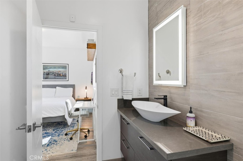 5487 Blanco Way Culver City, CA 90230 - Photo 37 of 58 a bathroom with a sink toilet and shower