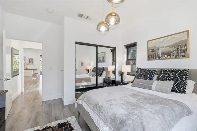 a view of an house with backyard porch and furniture