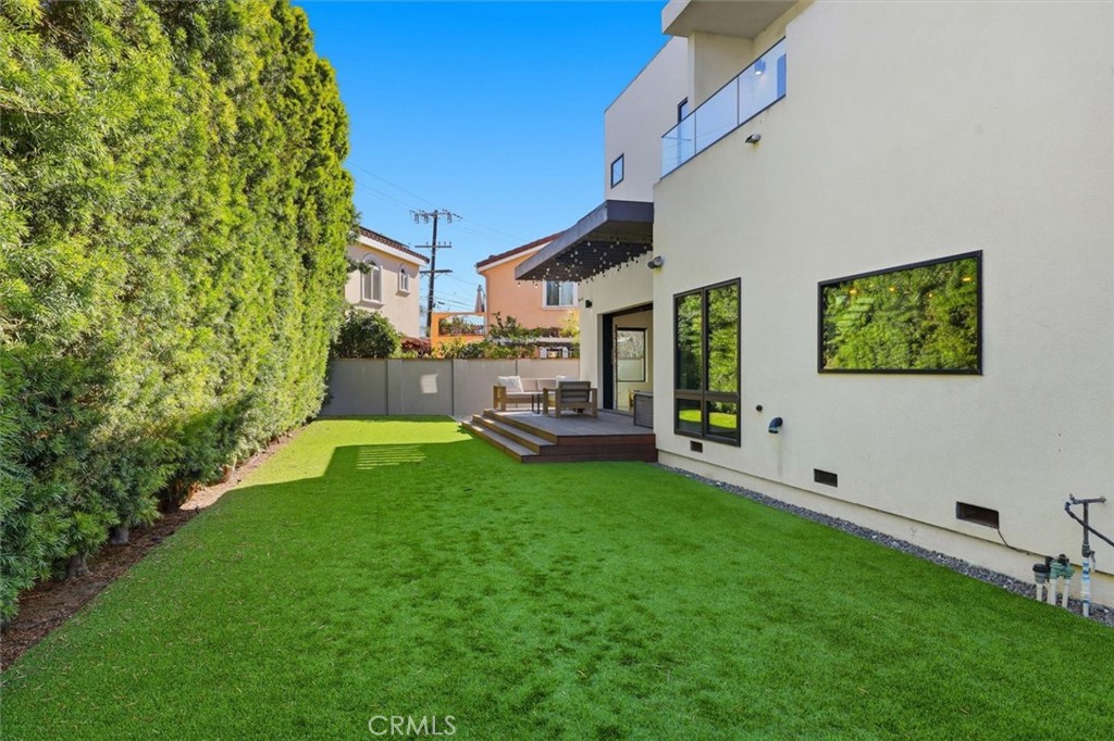 5487 Blanco Way Culver City, CA 90230 - Photo 48 of 58 a view of an house with backyard porch and furniture