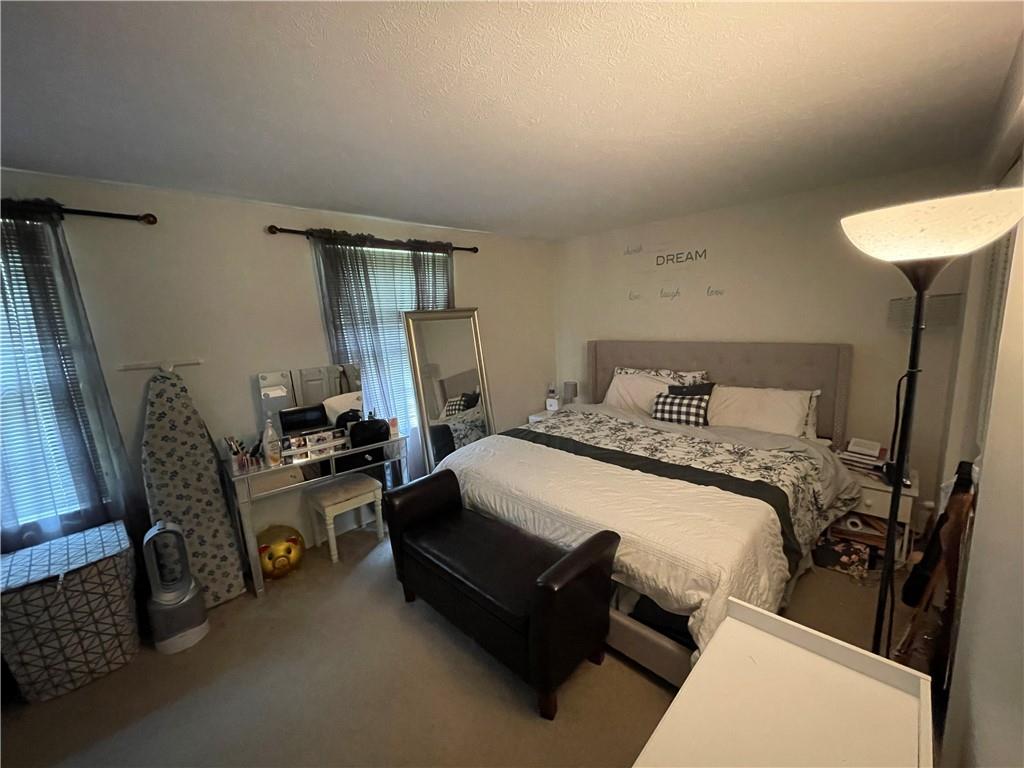 271 Quail Run Road Venetia, PA 15367 - Photo 12 of 30 a bedroom with bed and window