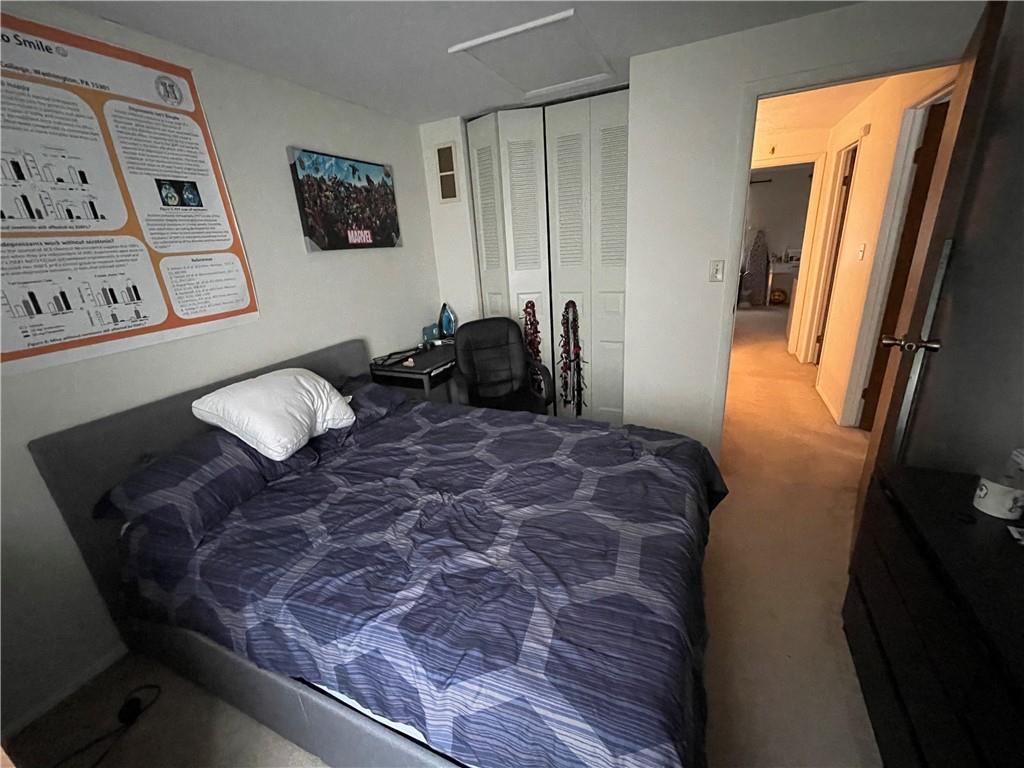 271 Quail Run Road Venetia, PA 15367 - Photo 18 of 30 a bed sitting in a bedroom next to a window